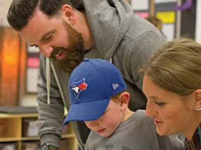 Parents and child learning together