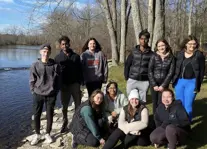 A picture of students by the water