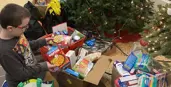 Student sorting food drive donations