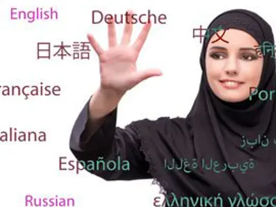 Student looking at screen with many languages