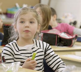 Little girl eating lunch