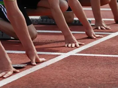 image of arms preparing for a running race