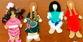 Faceless dolls created by students