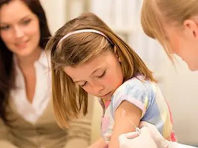 Student receiving immunization 