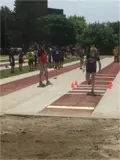 Students participating in long jump