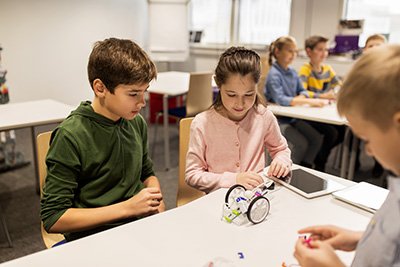 Students working with technology in a classroom