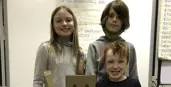 3 students with their robot